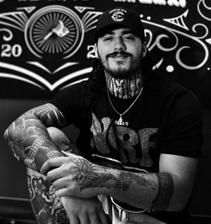 Enrique Guzman, an experienced tattoo Artist at Crowes Ink tattoo studio in Bradenton, Manatee County